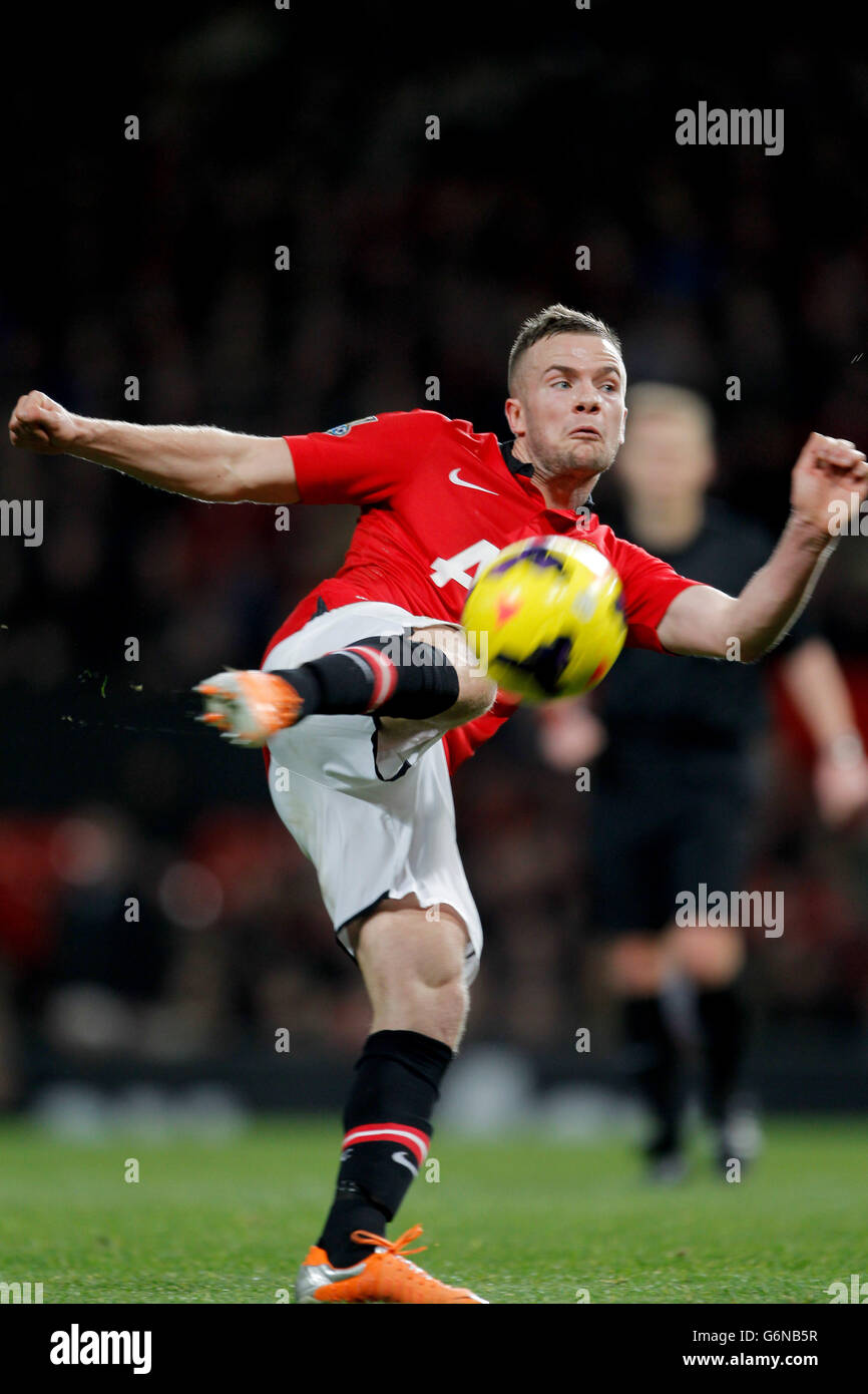 Soccer - Barclays Premier League - Manchester United v West Ham United - Old Trafford. Manchester United's Alexander Buttner volleys the ball Stock Photo