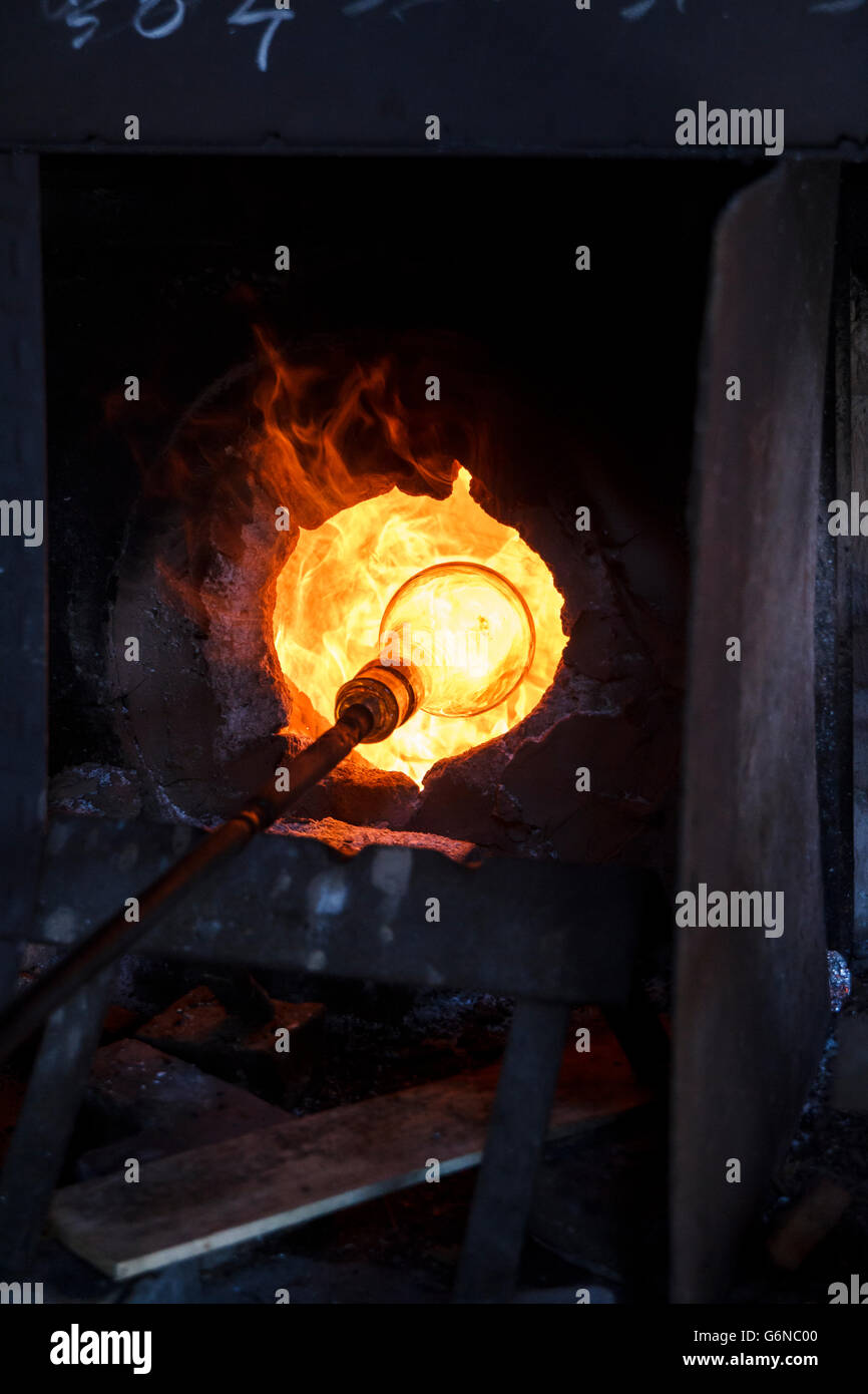 Glass heated in a furnace in a glass factory Stock Photo Alamy