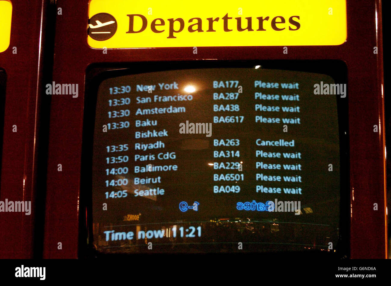 The departure monitor at London's Heathrow Airport displays the cancellation of flight BA263 to Riyadh. The cancellation came as British Airways flight BA223 to Washington was given the all clear to depart as normal. The clearance for the flight came after the airline was forced to cancel it two days running because of fears over security. Stock Photo