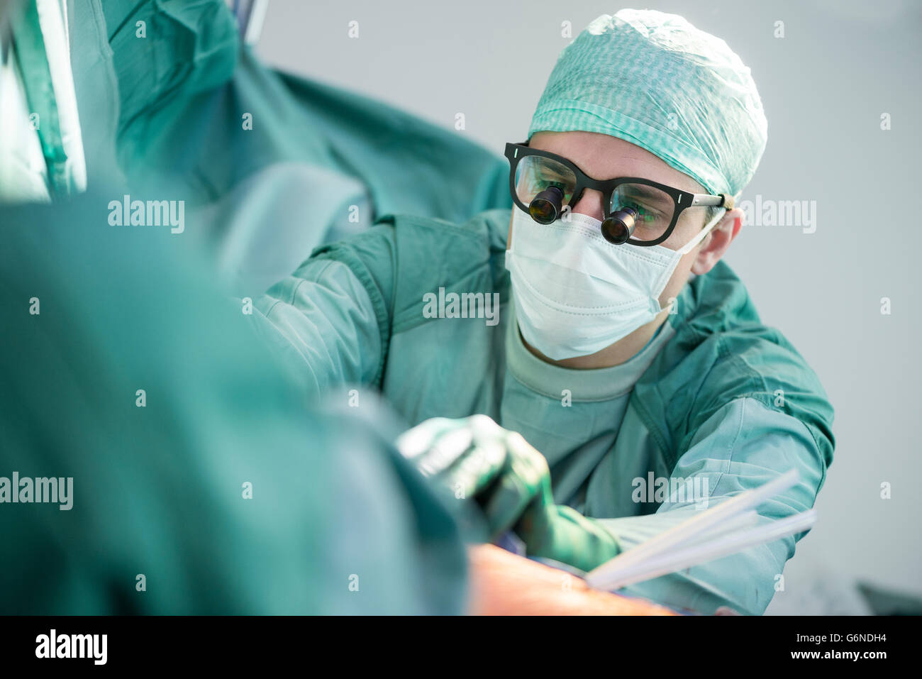 Heart surgeon during a heart operation Stock Photo Alamy
