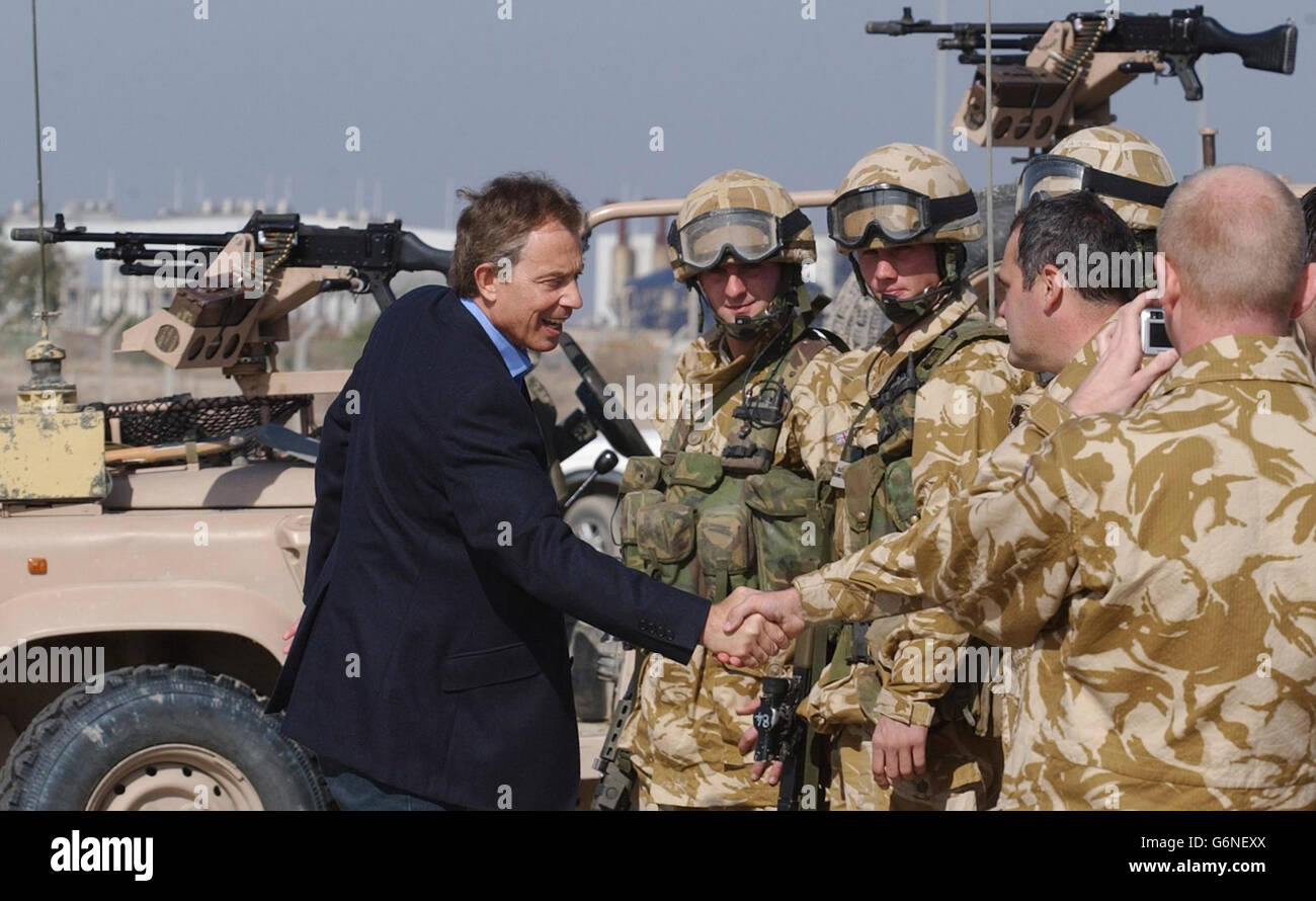 British Prime Minister Tony Blair meets troops as he arrives in Basra for a surprise visit to British soldiers in Iraq. Stock Photo