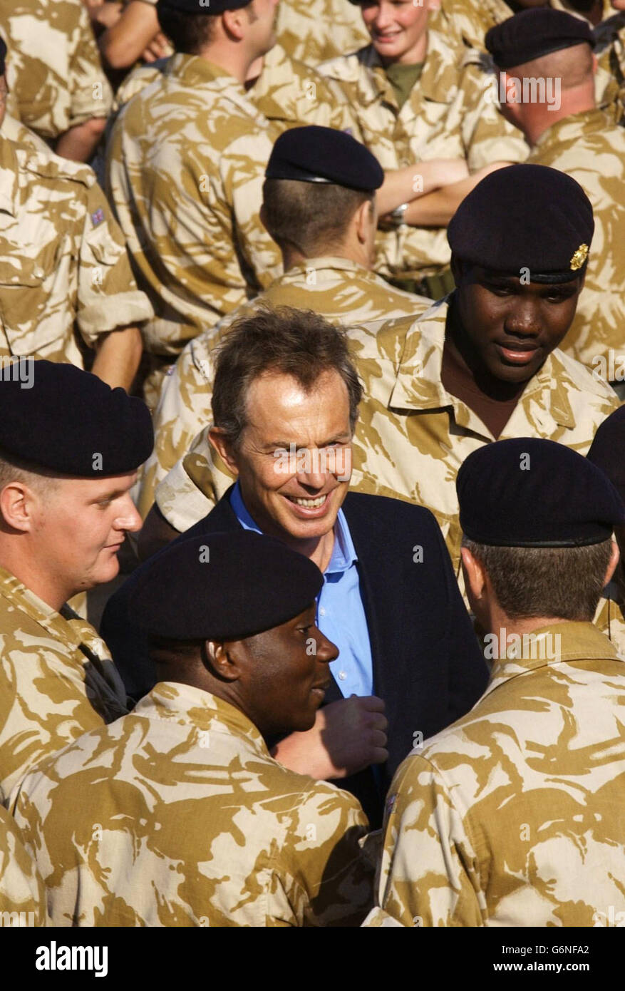 British Prime Minister Tony Blair meets troops as he arrives in Basra for a surprise visit to British soldiers in Iraq. Stock Photo