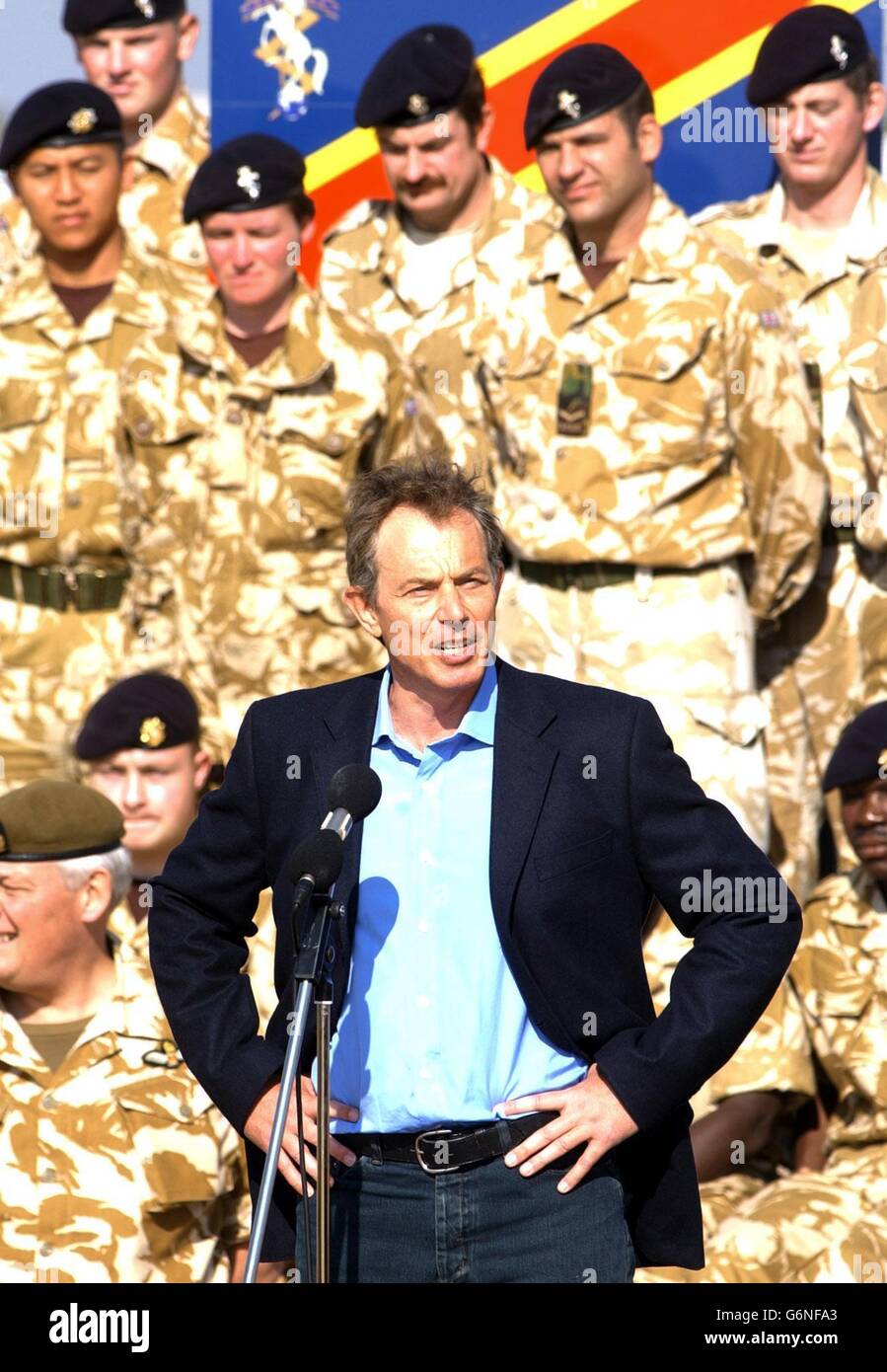 British Prime Minister Tony Blair addresses troops as he arrives in Basra for a surprise visit to British soldiers in Iraq. Mr Blair told the troops: It's a great honour for me to be here today. The first thing I want to say is a huge thank you for the work you're doing here. 17/10/04: The Government faced opposition demands for a Commons statement on plans to deploy British troops in support of the Americans around Baghdad. Blair was warned that British forces in Iraq could face a dangerous backlash if US attempts to seize the insurgent stronghold of Fallujah ended in mass bloodshed. Stock Photo
