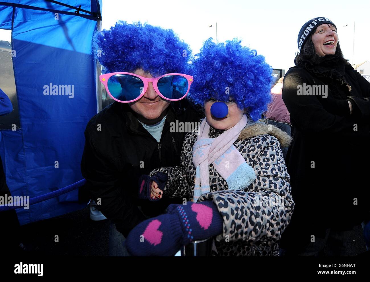 Everton fans enjoy fancy dress in fan zone hires stock photography and
