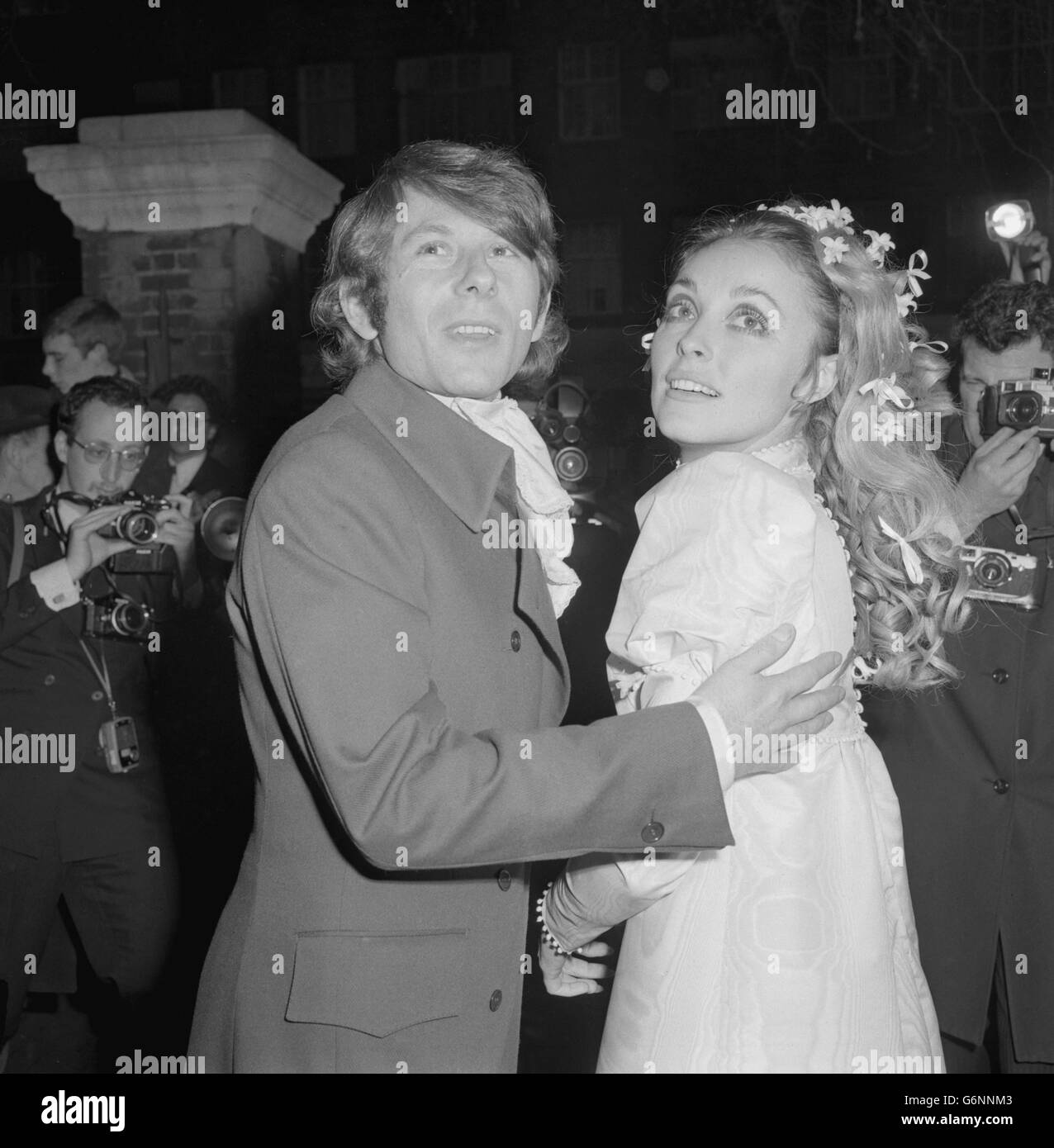 Actress Sharon Tate, 25, star of the film Valley of the Dolls, and her bridegroom, film director Roman Polanski after their wedding at Chelsea Register Office in London. Sharon wore a mini-dress of Victorian taffeta. Stock Photo
