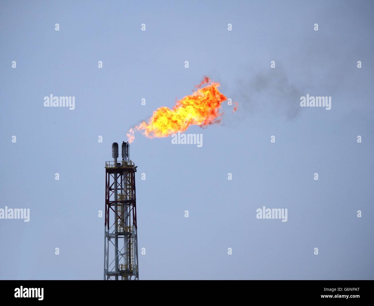 refinery fire gas torch on sky background Stock Photo - Alamy