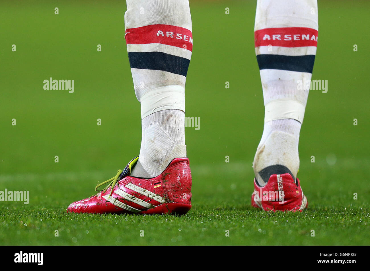 Close up detail of the socks and football boots of a Arsenal player Stock  Photo - Alamy