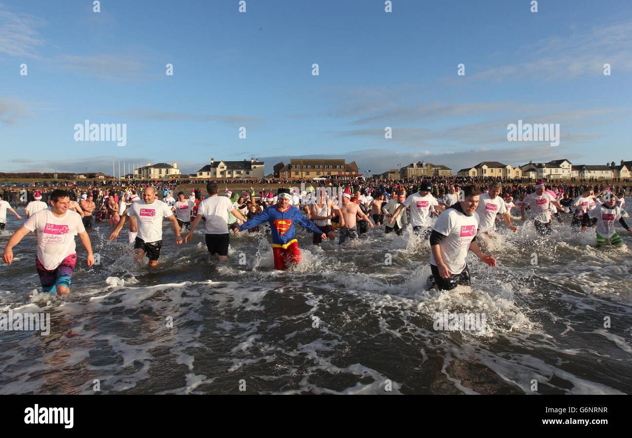 Charity swimmers take a dip in the sea at Prestwick Beach to raise ...
