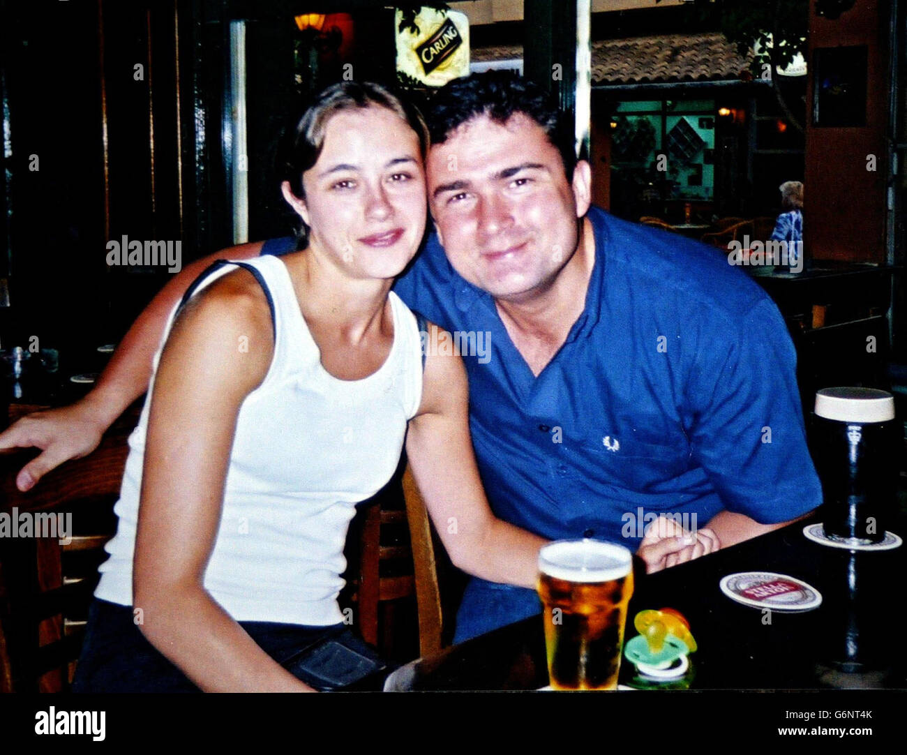Collect picture of Andrew Hollingworth, 31, with fiancee Georgina. Mr Hollingworth is trapped in China after being accused of failing to pay a debt, it emerged. Hollingworth, 31, of Droylsden, Manchester, has been wrongly accused of owing eight million US dollars to a Chinese supplier, according to his father. Stock Photo