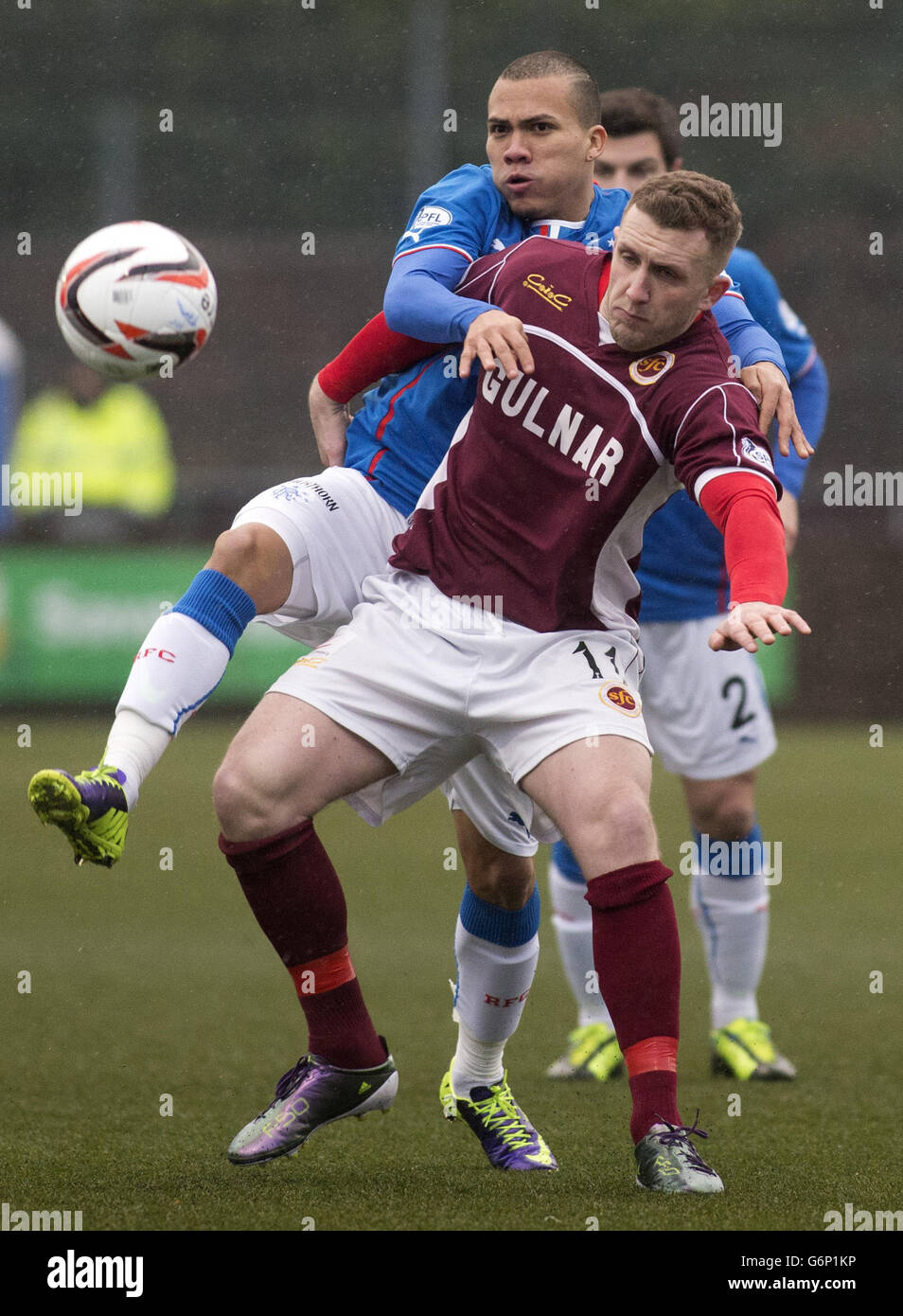 Rangers' Arnold Peralta and Stenhousemuir's Kevin McKinlay in action during the Scottish League One match at Ochilview Park, Stenhousemuir Stock Photo