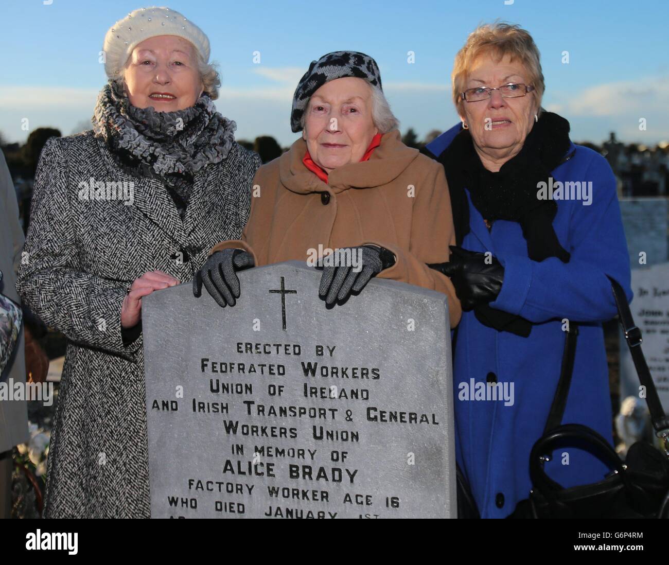 (left- right) Lily Blackwell, Bridget Traynor and Brida Guilfoyle attend the last commemoration of the 100th anniversary of the funeral of their aunt Alicia Brady at Glasnevin Cemetery, Dublin. Stock Photo