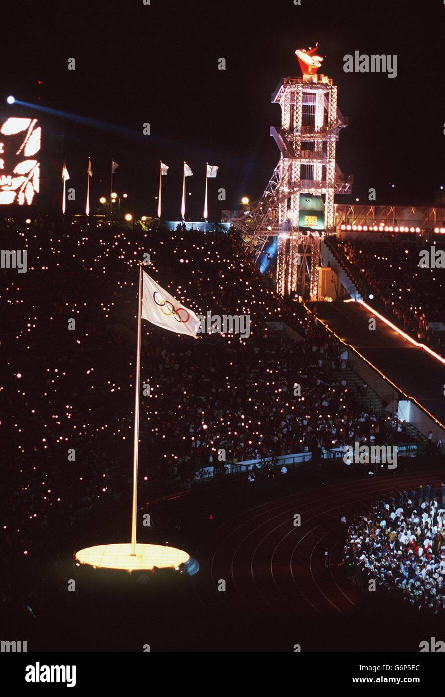 Flame and flag at the opening ceremony in atlanta hires stock