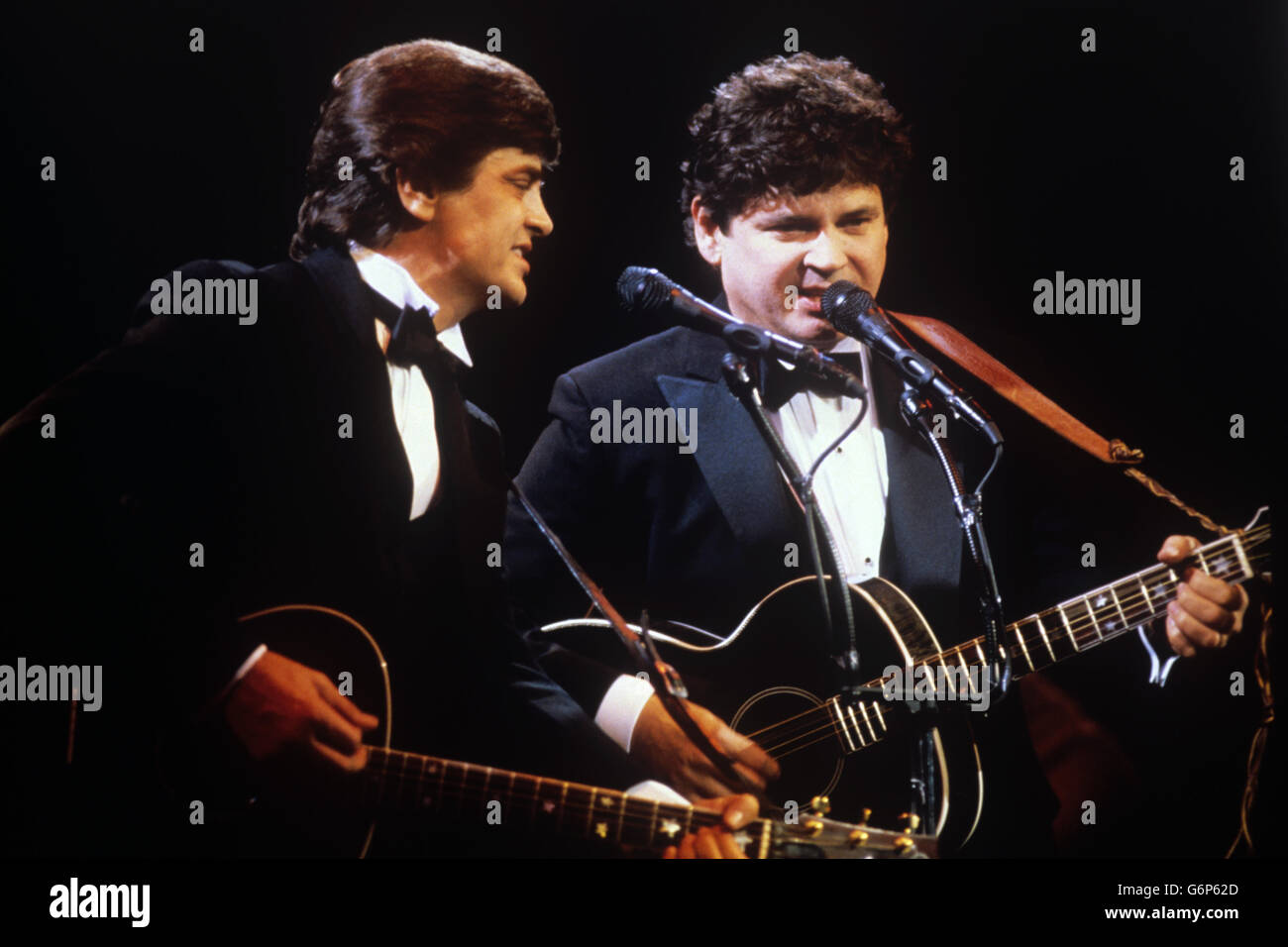 Phil (l) and Don Everly, the American rock duo of the 1950s and 1960s, performing at the Royal Albert Hall, London. The concert was their first together in 10 years. Stock Photo