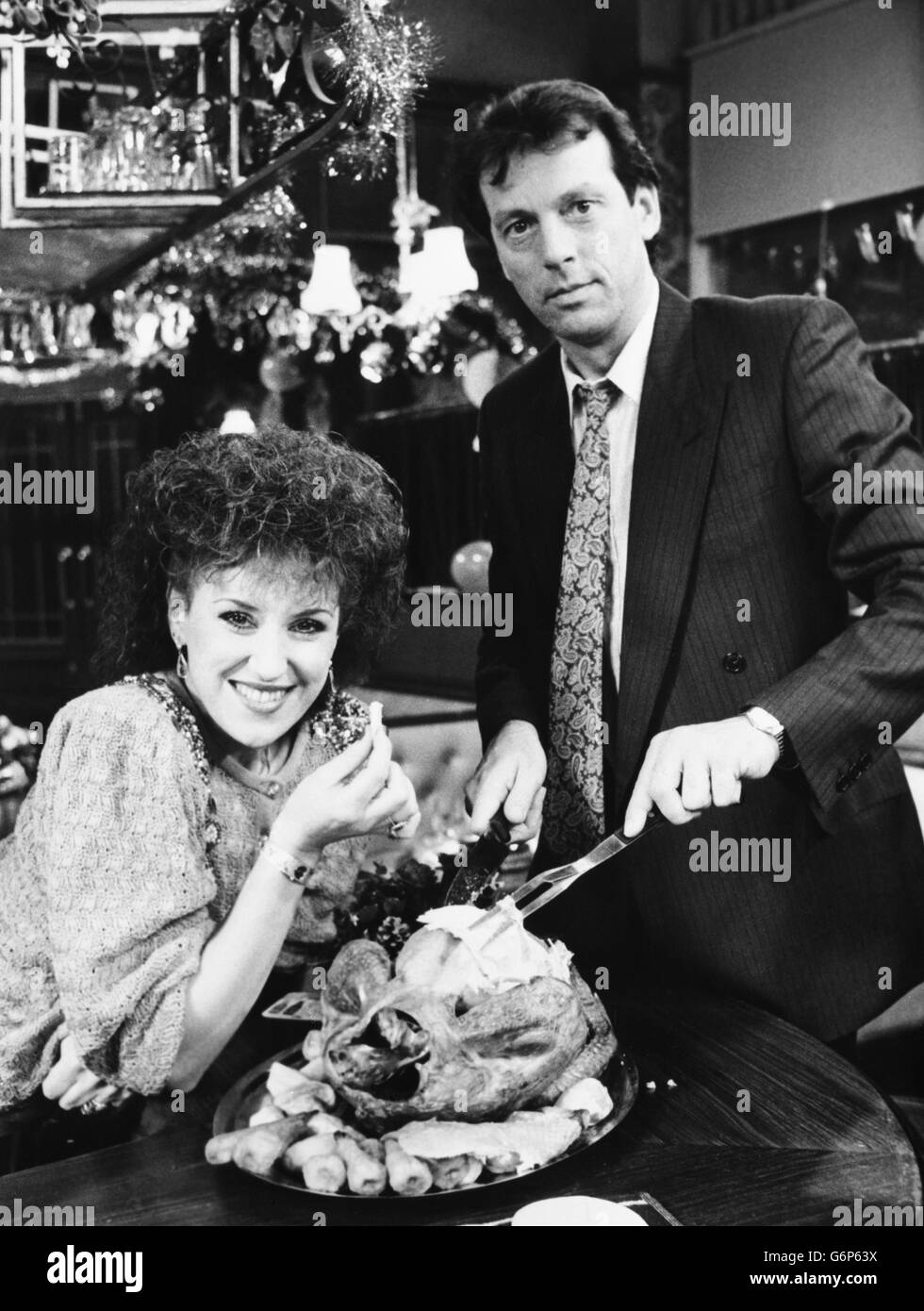 Leslie Grantham as Den Watts and Anita Dobson as Angie promote the Christmas episodes of EastEnders. Stock Photo