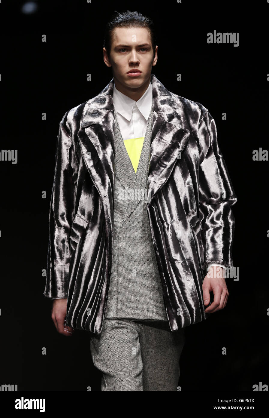 A model appears on the catwalk during the Alan Taylor portion of the ...