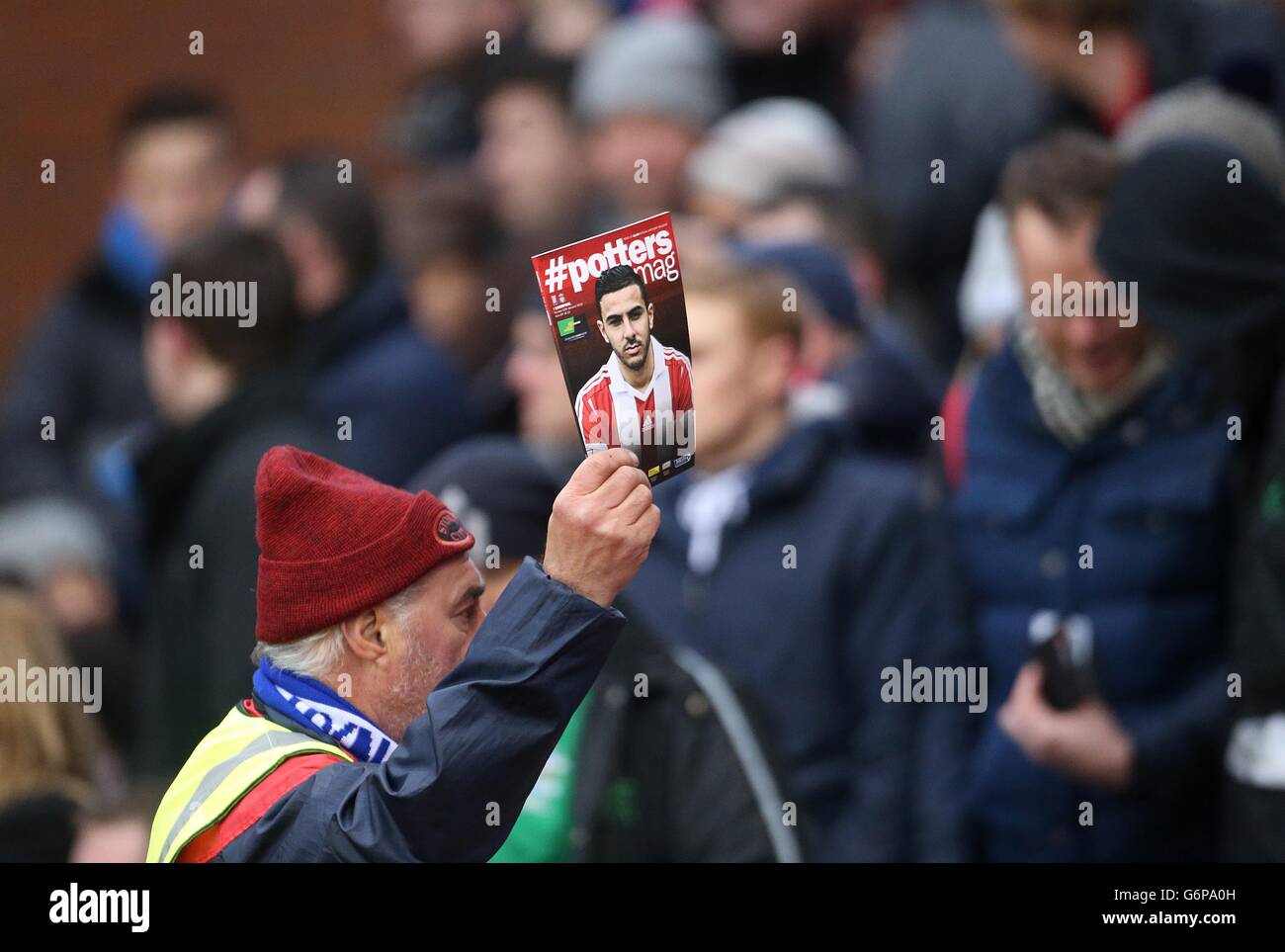 Programme seller sells the match programme to fans in the hi-res stock ...