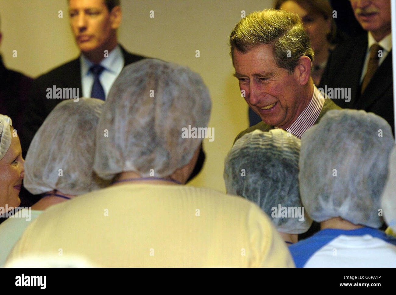 The Prince of Wales meets workers during his visit to Coldwater Seafood UK in Grimsby, where he is to discuss the environmental, social and economic consequences of overfishing. After seeing the fish factory, his final visit of the two-day tour will be to Lincolnshire Organics at Holme, near Scunthorpe. Stock Photo