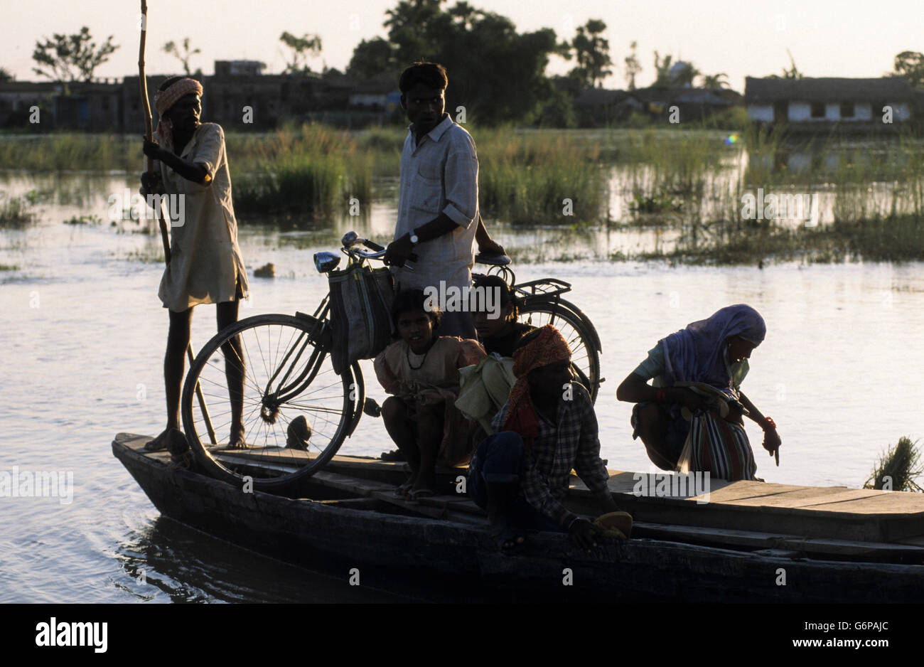 India Bihar , submergence at Bagmati river a branch of ganges due to heavy monsoon rains and melting Himalaya glaciers, transport by boat Stock Photo