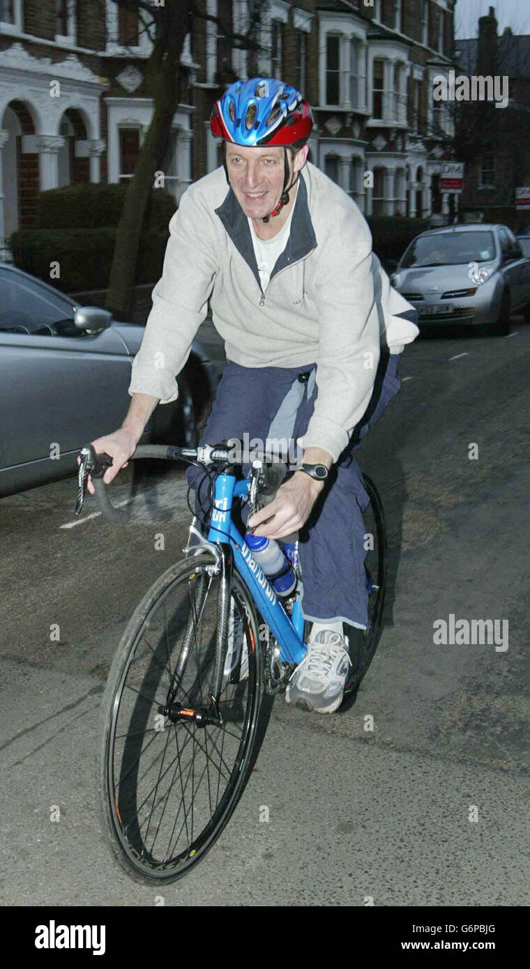 Alastair Campbell, the former Director of Communications to British Prime Minister Tony Blair, arrives at his home in north London, after a bicycle ride. The report by Lord Hutton into events surrounding the death of weapons expert Dr David Kelly will be released to the Government and other parties involved later Tuesday ahead of its formal publication tomorrow. Stock Photo