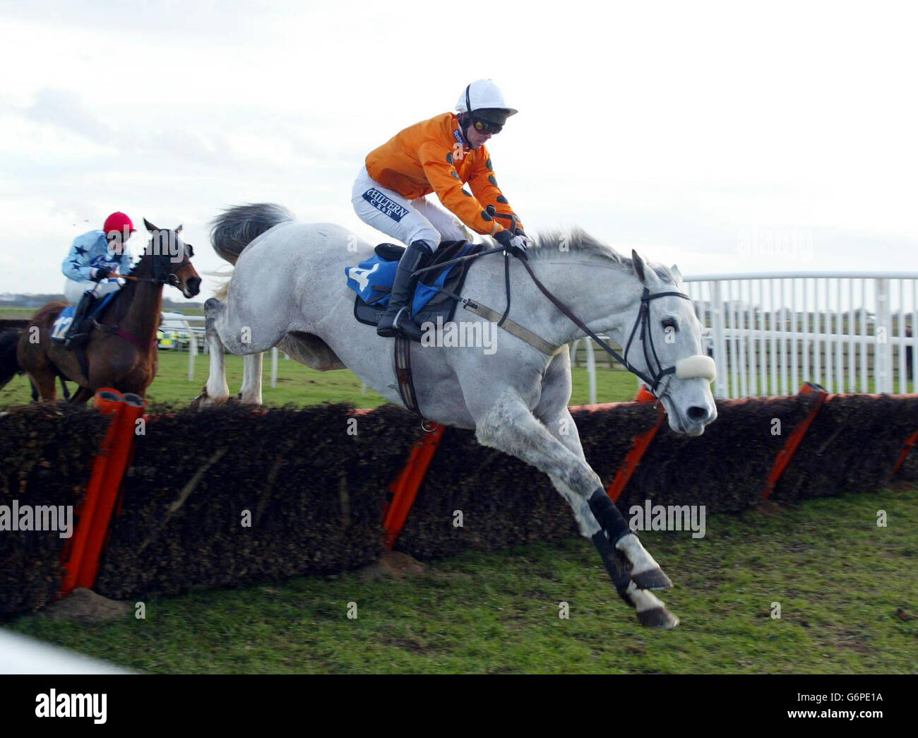 Horseracing Grey Abbey in the 'Tote Betxpress Handicap Hurdle'. Grey Abbey ridden by jockey Graham Lee jumps the last to win ahead of Just Maybe in the 'Tote Betxpress Handicap Hurdle' at Catterick. Stock Photo