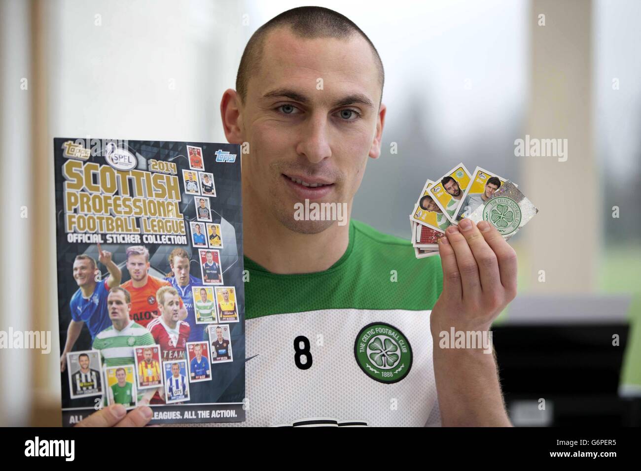 Celtic's Scott Brown promotes the first ever SPFL sticker album, published by Topps, at Lennoxtown Training Ground, Glasgow. Stock Photo