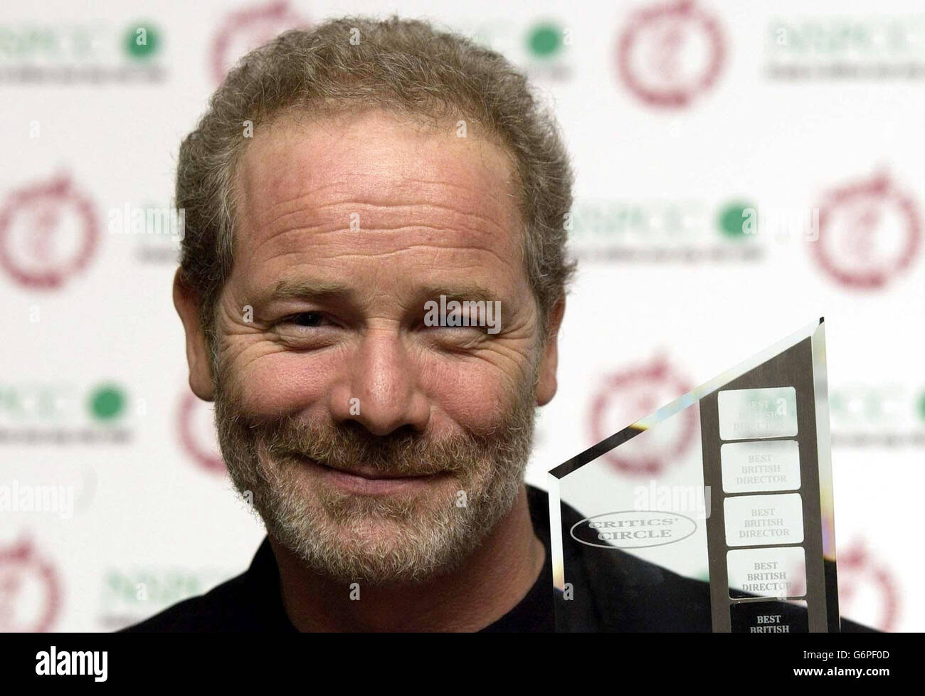 Peter Mullan with his award for Best British Director for his film The