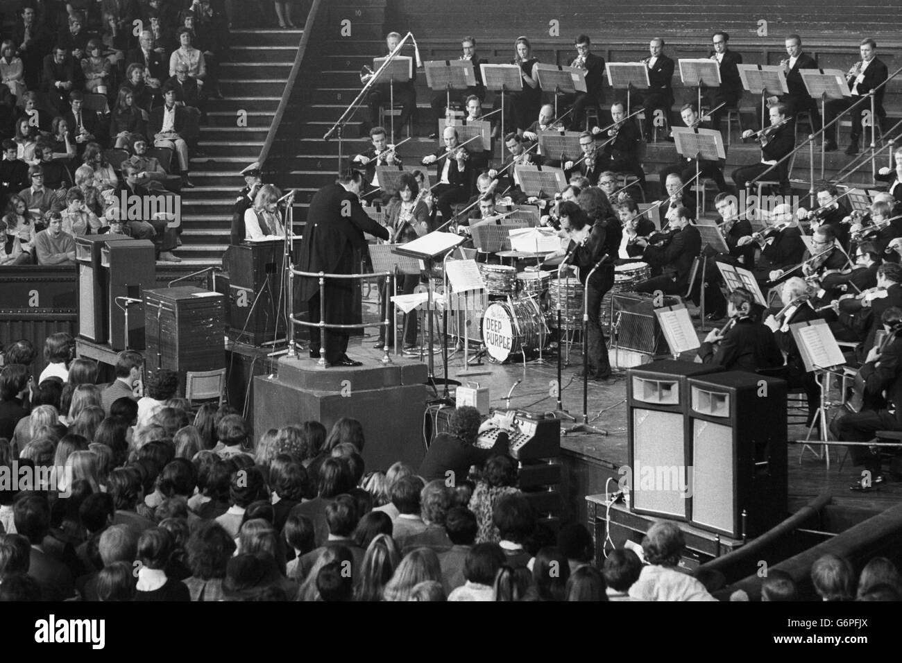 Conductor Malcolm Arnold conducts the rehearsal of Deep Purple's 'Concerto for Group and Orchestra', composed by the group's organist, Jon Lord. The piece will be performed by the group for the time, together with the Royal Philharmonic Orchestra under Mr Arnold's baton at the Royal Albert Hall in aid of Task Force. Stock Photo