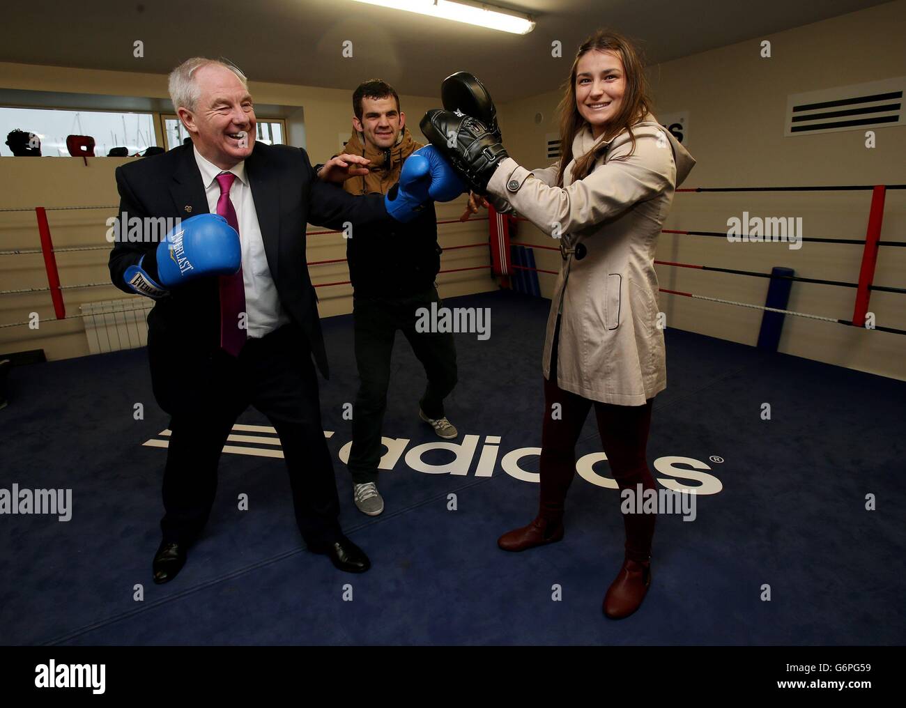 Minister of State for Sport and Tourism Michael Ring T.D. with Olympic boxing gold medalist Katie Taylor and Olympic boxer Adam Nolan at the opening of the revamped Bray Boxing club, Wicklow, where they train. Stock Photo