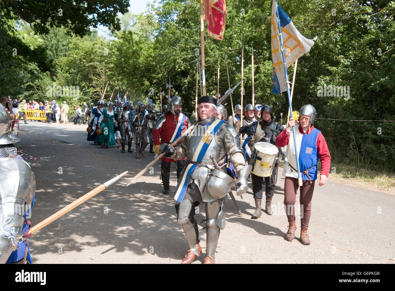 Tewkesbury, UKJuly 17, 2015 Knights in armour marching toward battle