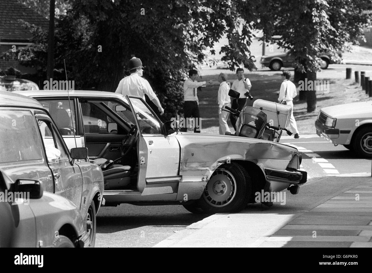 The wreckage of Ford Granada used in a getaway attempt, after an armed robbery went wrong in Shooter's Hill, London. Police shot dead two men involved in the incident. Stock Photo