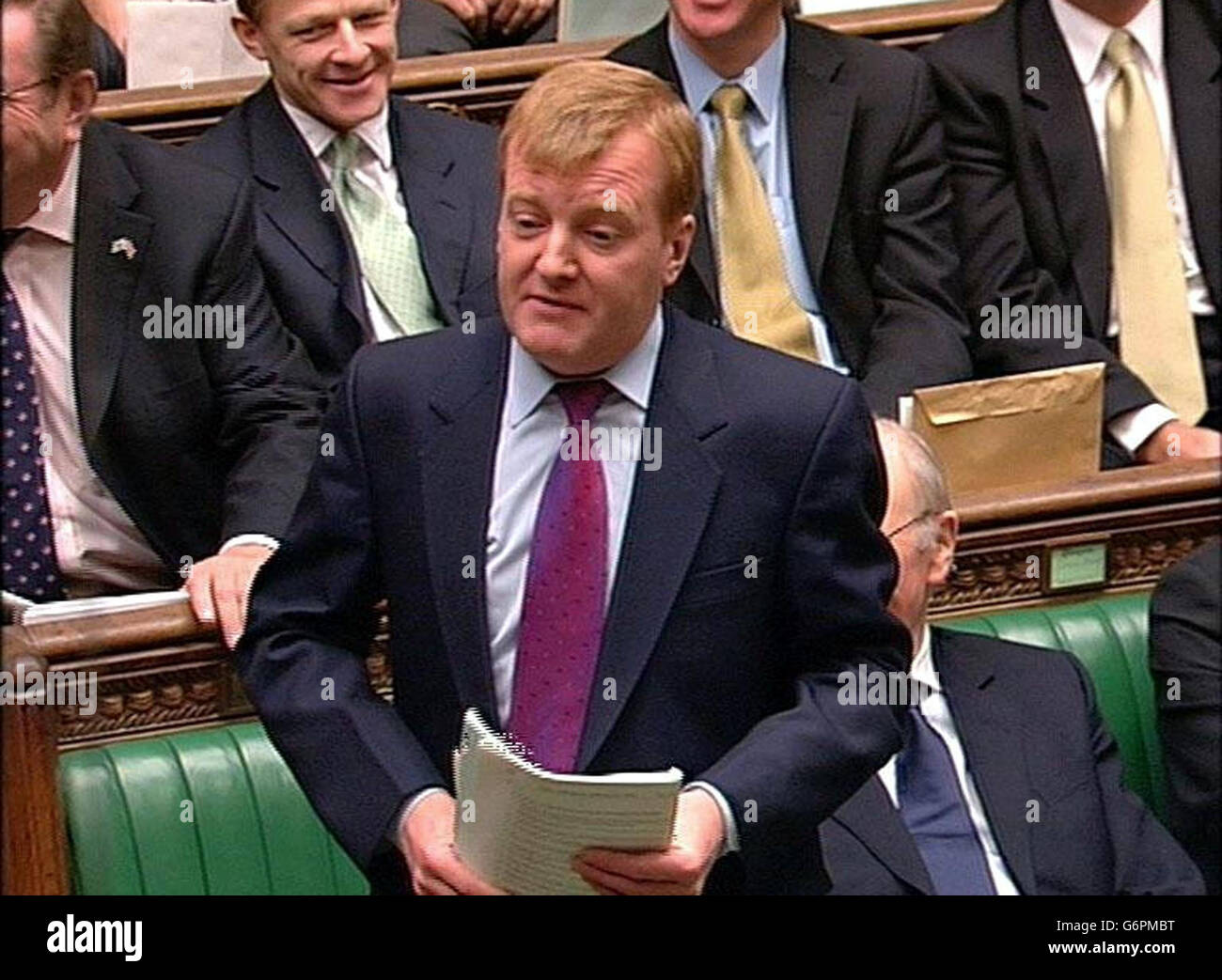 Liberal Democrat leader, Charles Kennedy, questioning Prime Minister Tony Blair during his regular weekly Question Time in the House of Commons, London. Mr Kennedy was among MP's who challenged the Prime Minister ahead of the formal publication of the Hutton report into the circumstances surrounding the death of Government weapons expert Dr David Kelly. Stock Photo