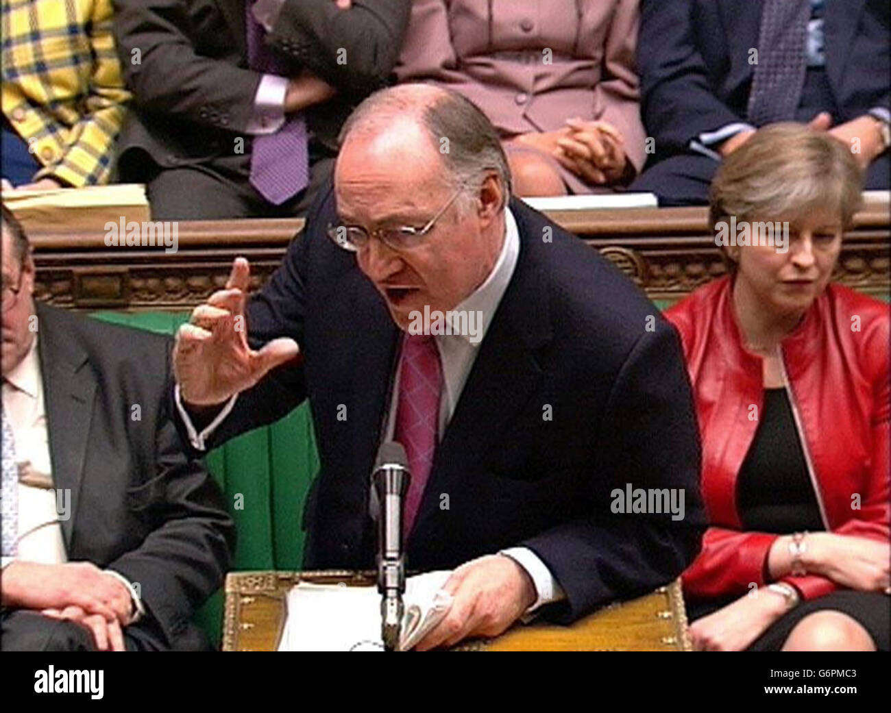 Leader of the Conservative Party, Michael Howard, questioning Prime Minister Tony Blair during his regular weekly Question Time in the House of Commons, London. Mr Howard was among MP's who challenged the Prime Minister ahead of the formal publication of the Hutton report into the circumstances surrounding the death of Government weapons expert Dr David Kelly. Stock Photo