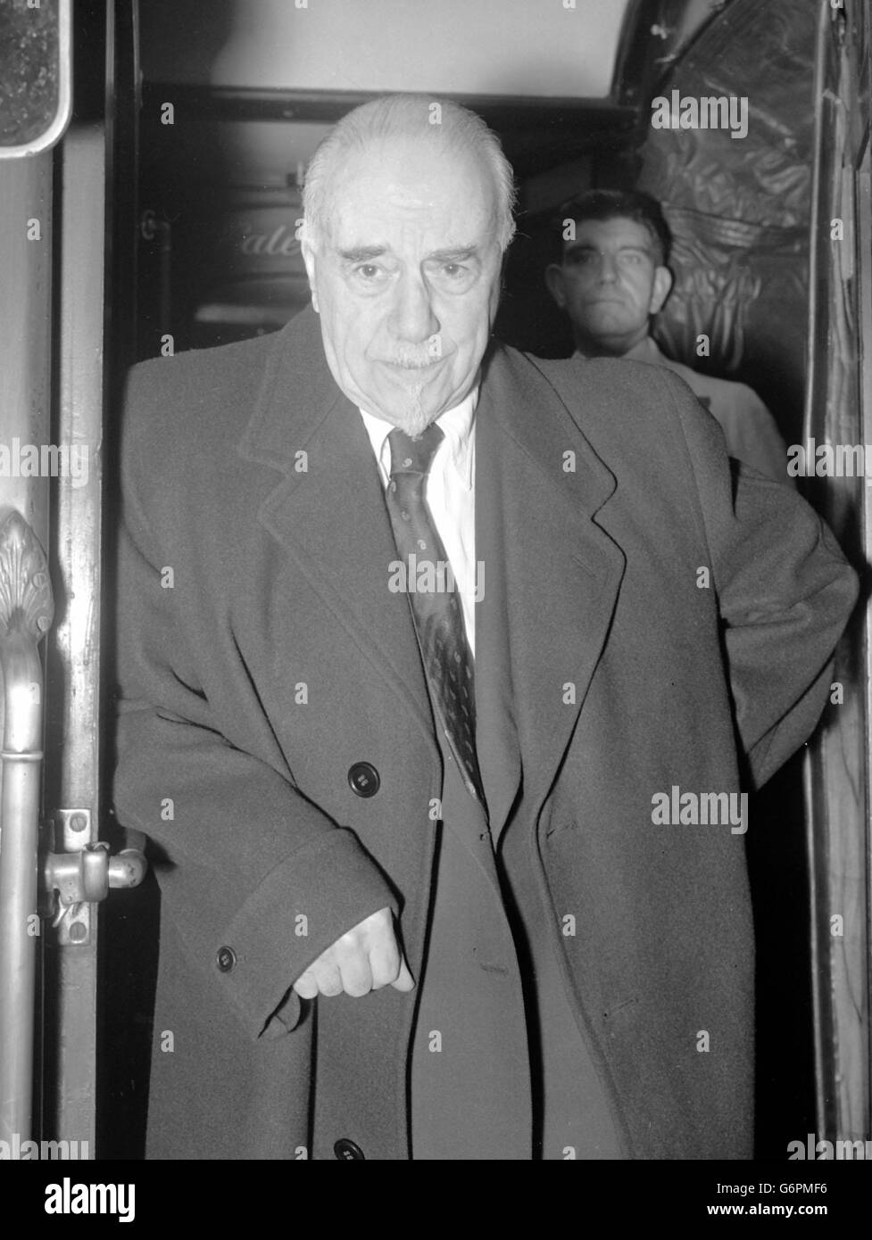 Conductor Sir Thomas Beecham leaves Waterloo Station, London, on the Cunard 'Caronia' boat train en route to the sunny Caribbean. Stock Photo