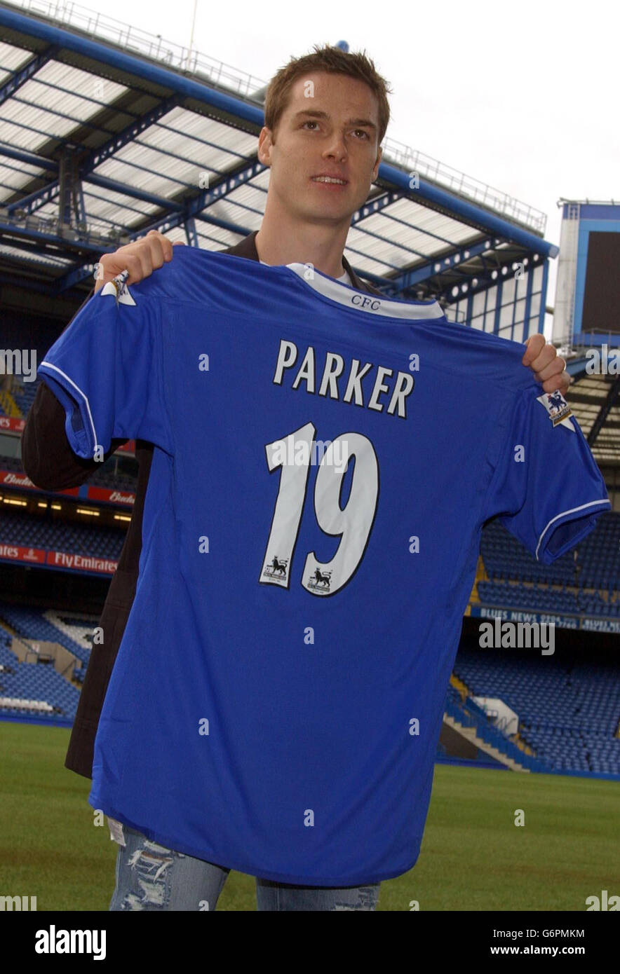 Scott Parker holds his 19 shirt as he is unveiled as Chelsea's new signing at Stamford Bridge, London. Chelsea signed the former Charlton midfielder for 10 million, the latest in a string of big money signings since Russian billionaire Roman Abramovich bought the club last July. Stock Photo