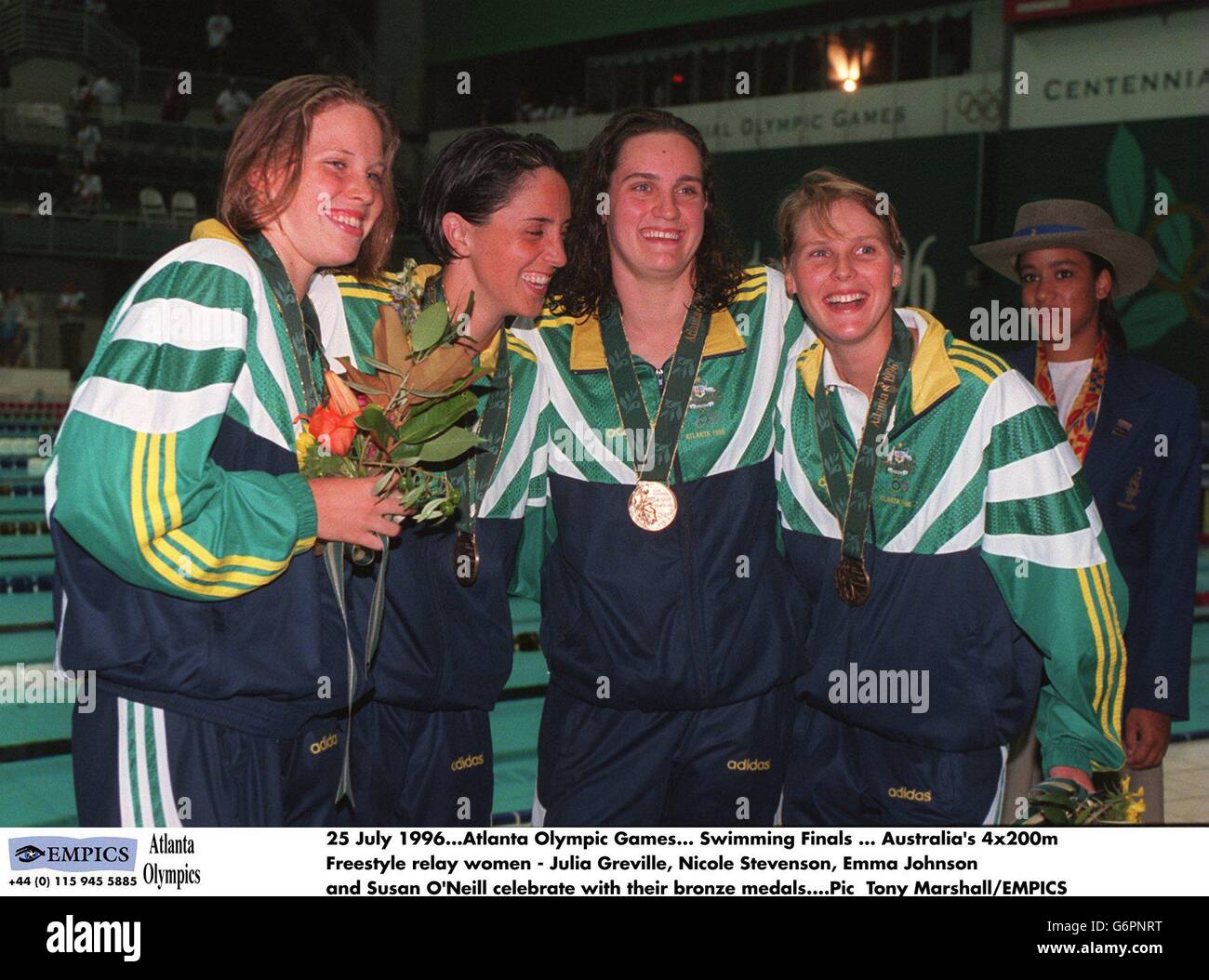 25 July 1996. Atlanta Olympic Games. Swimming Finals, Australia's 4 x 200m Freestyle relay women team- Julia Greville, Nicole Stevenson, Emma Johnson and Susan O'Neill celebrate with their bronze medals Stock Photo