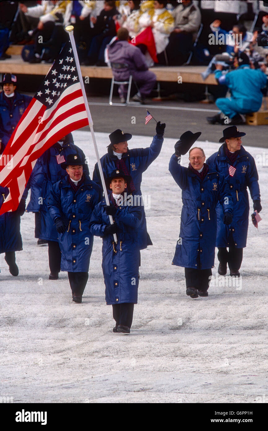 Eric Flaim, Flag bearer leads Team USA marching in the Opening ceremonies at the 1998 Olympic Winter Games, Nagano, Japan Stock Photo