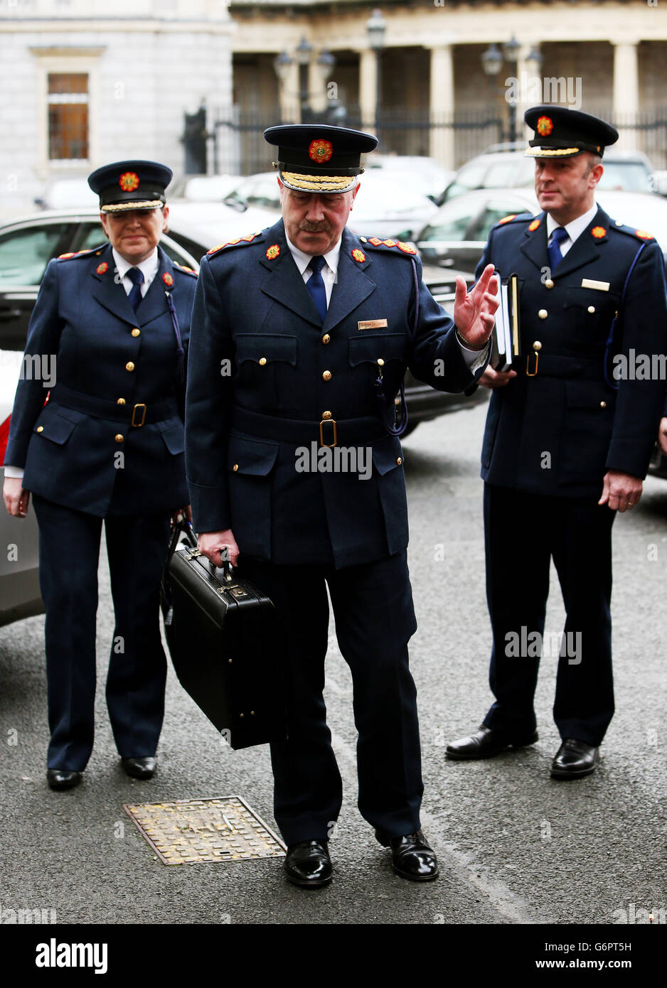 Garda Commissioner Martin Callinan (centre) with Deputy Commisioner Noirin O'Sullivan (left) and Assistant Commissioner John Twomey arrive at Leinster House to appear before the Dail Public Accounts Committee over the penalty points controversy. Stock Photo