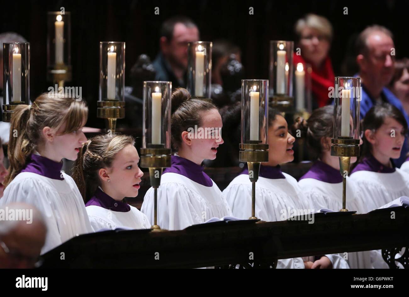 Members of the Canterbury Cathedral Girls Choir sing in their first