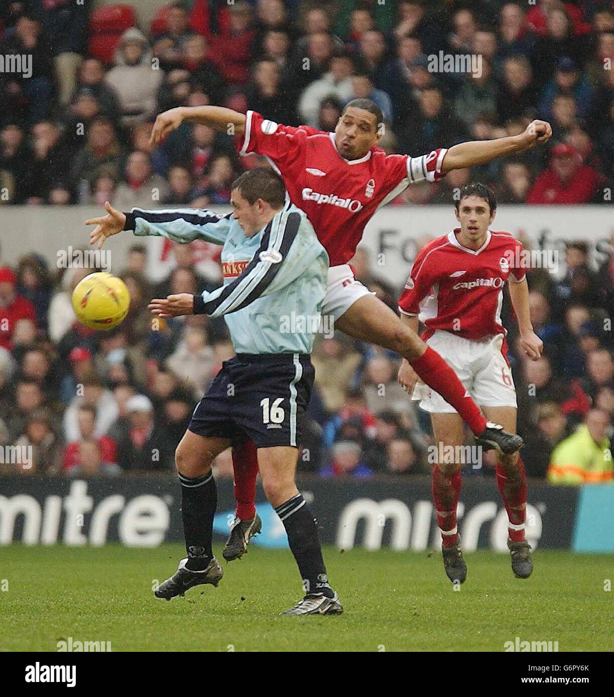Walsall's Gary Birch holds off Nottingham Forest's Des Walker during the Nationwide Division One match at the City Ground, Nottingham, Saturday 14 February, 2004. . Stock Photo