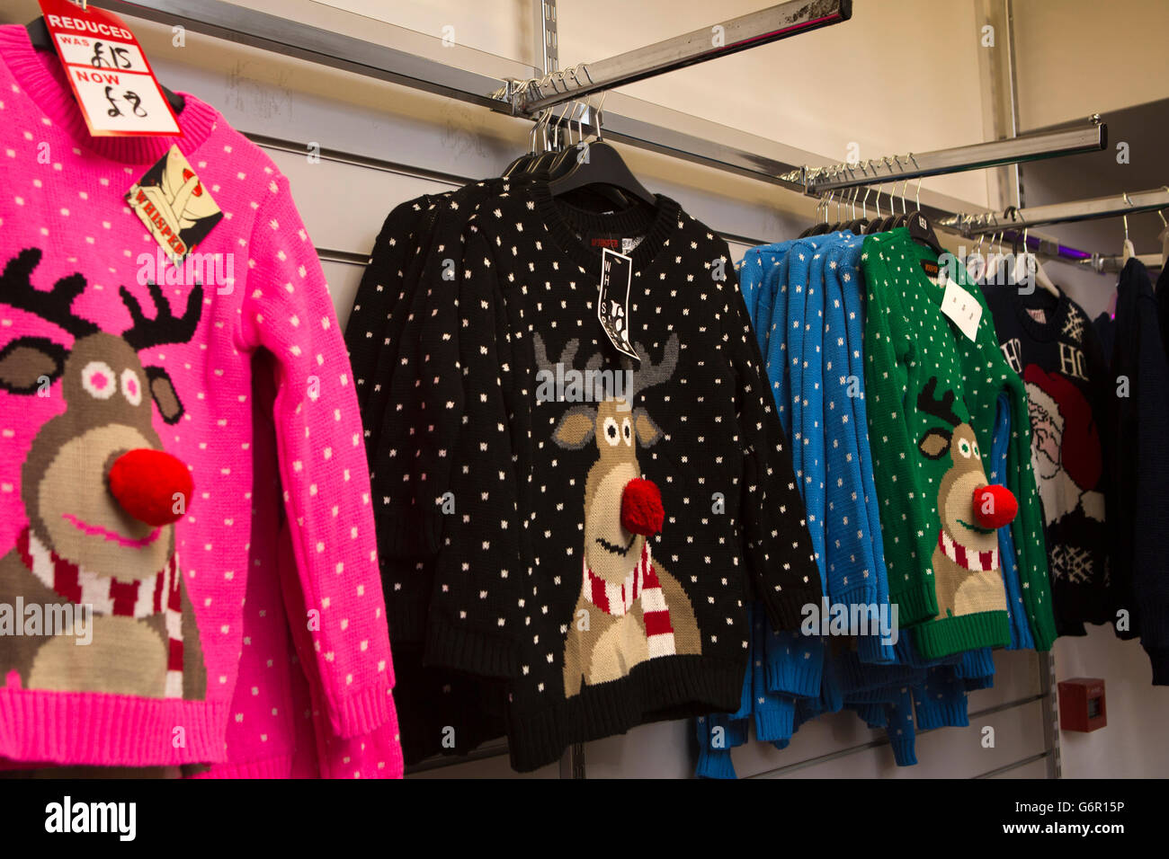UK, Gloucestershire, Gloucester, King’s Walk shopping Centre, children's reindeer Christmas pullovers Stock Photo