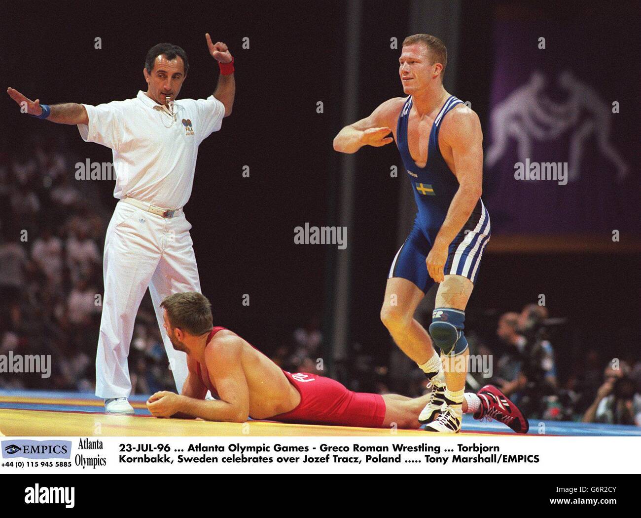23-JUL-96. Atlanta Olympic Games - Greco Roman Wrestling. Torbjorn Kornbakk, Sweden celebrates over Jozef Tracz, Poland. Tony Marshall/EMPICS Stock Photo