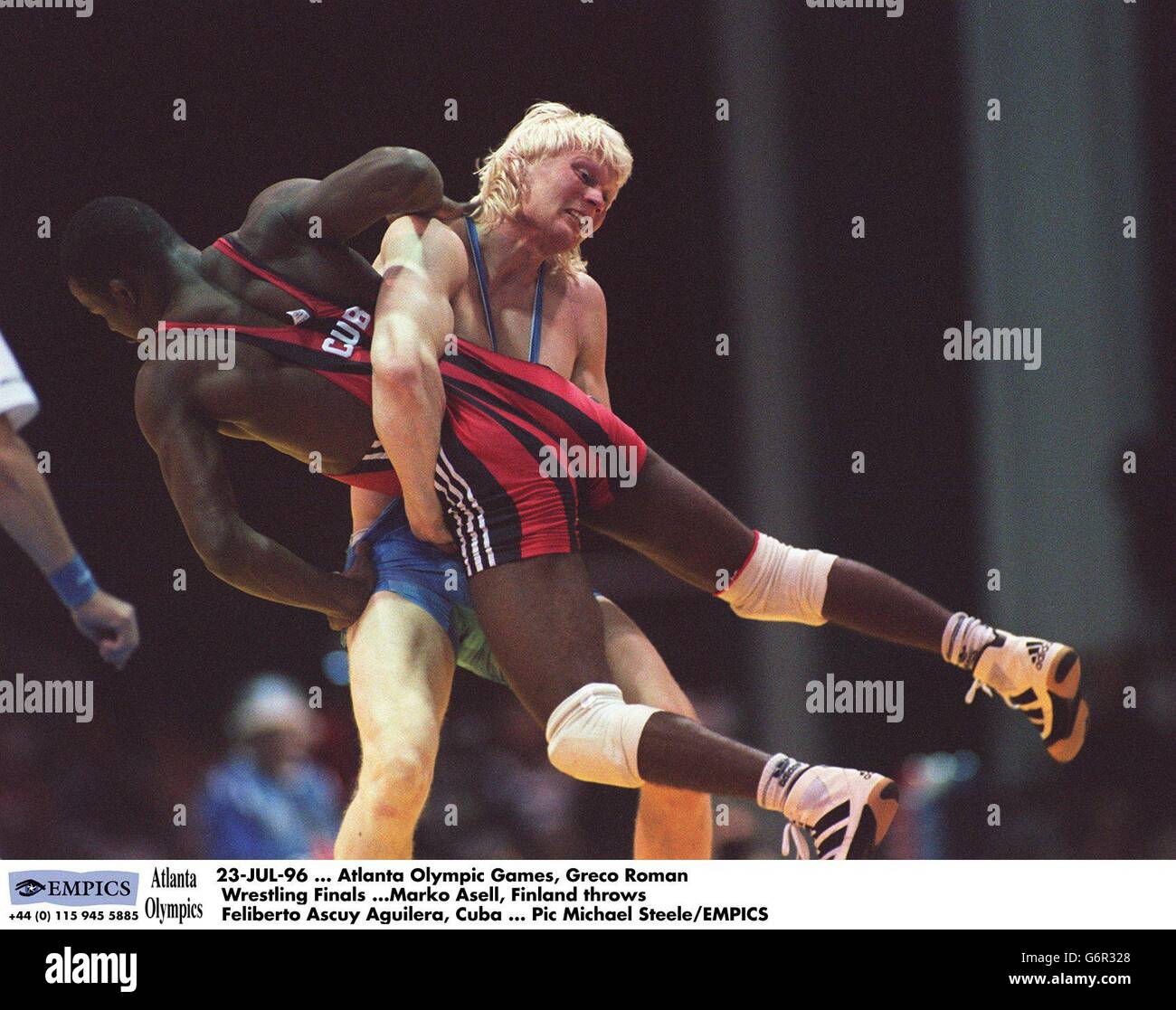 23-JUL-96, Atlanta Olympic Games, Greco Roman Wrestling Finals, Marko Asell, Finland throws Feliberto Ascuy Aguilera, Cuba Stock Photo