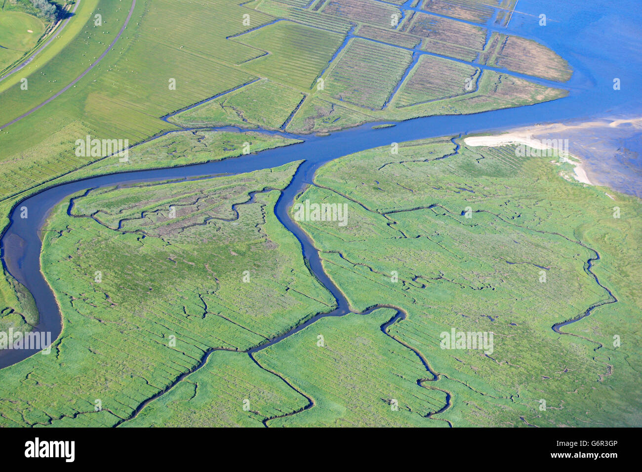 Marshland between Hitzsand and dike St Peter-Ording, Eiderstedt, Schleswig-Holstein, Germany Stock Photo
