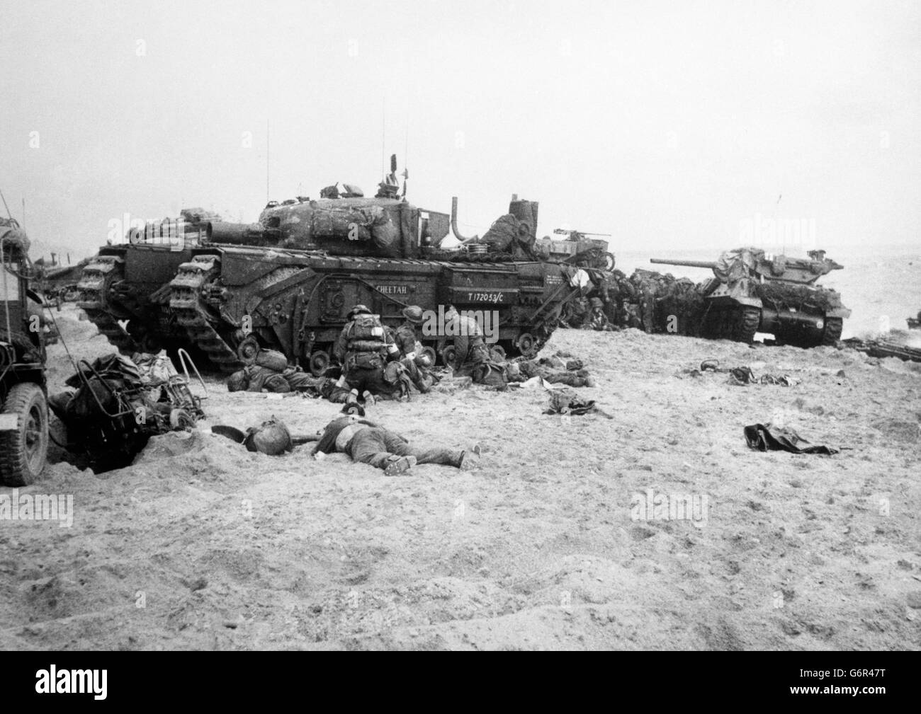 Troops and tanks on a landing beach in Normandy. Undated picture. Stock Photo