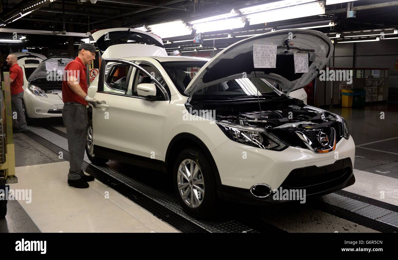 A Nissan employee works on the second generation Qashqai, at the Nissan plant in Sunderland, where the workforce is set to increase to more than 7,000 for the first time. Stock Photo