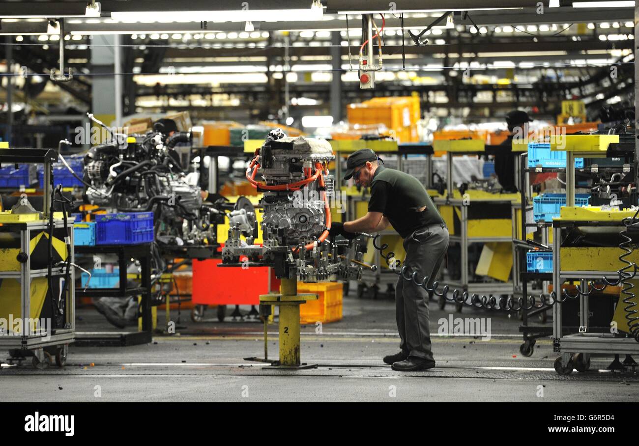 A Nissan employee works on the second generation Qashqai, at the Nissan plant in Sunderland, where the workforce is set to increase to more than 7,000 for the first time. Stock Photo