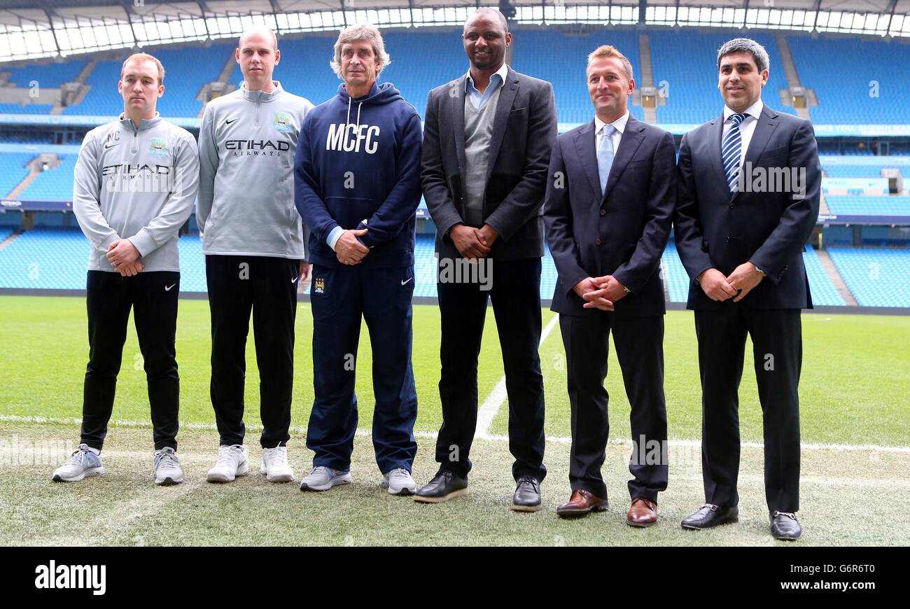 Manchester City Coaching Staff during the re-launch of Manchester City Women's FC at the Etihad Stadium, Manchester. PRESS ASSOCIATION Photo. Picture date: Friday January 24, 2014. See PA story SOCCER Man City. Photo credit should read: Peter Byrne/PA Wire. Stock Photo