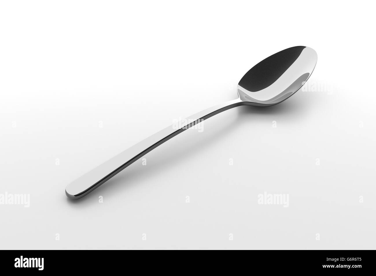 Silver spoon on a table Stock Photo Alamy