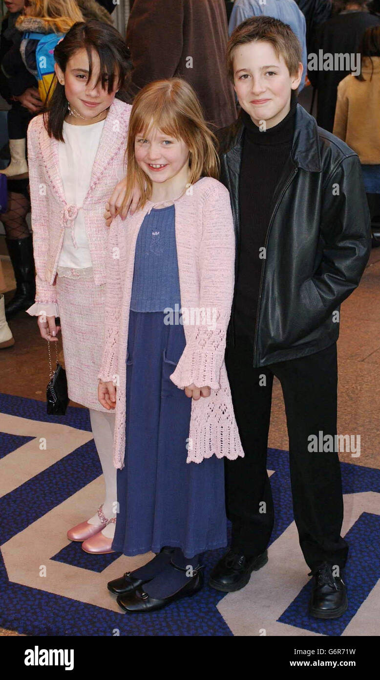 Stars of the film (from left to right) Yasmine Paige, Maisie Preston and Rory Copus arrive for the world charity premiere of "Tooth" at the Odeon West End in Leicester Square, central London. Stock Photo