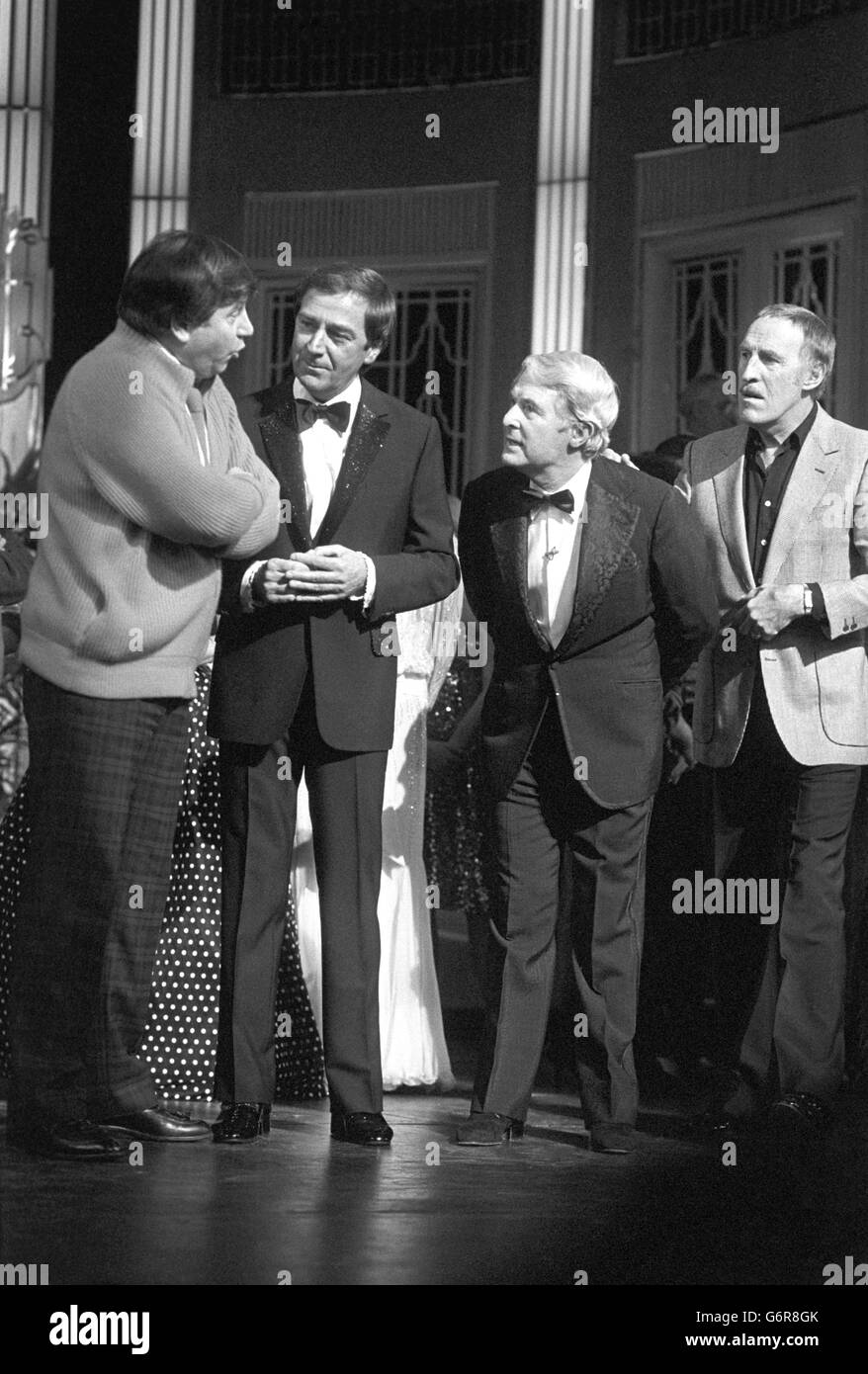 (l-r) Jimmy Tarbuck, Des O'Connor, Ernie Wise and Bruce Forsyth at the London Palladium, where they performed in a charity show held in memory of Eric Morecambe. Stock Photo